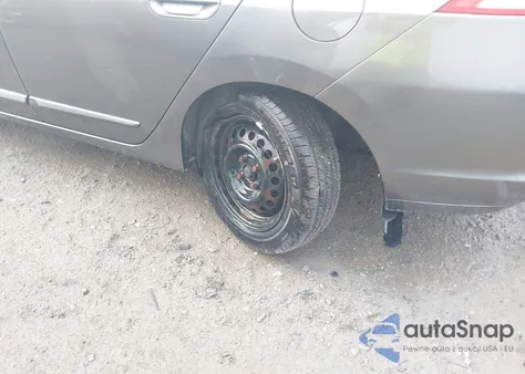 2011 Honda Insight from USA, damaged, VIN JHMZE2H34BS005548